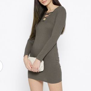 Olive green long sleeve ribbed lace up bodycon mini dress. Size XS.